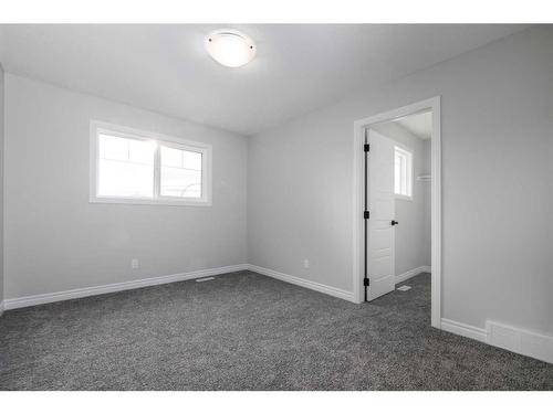 443 Rivercrest View, Cochrane, AB - Indoor Photo Showing Other Room