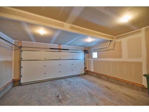 443 Rivercrest View, Cochrane, AB - Indoor Photo Showing Garage