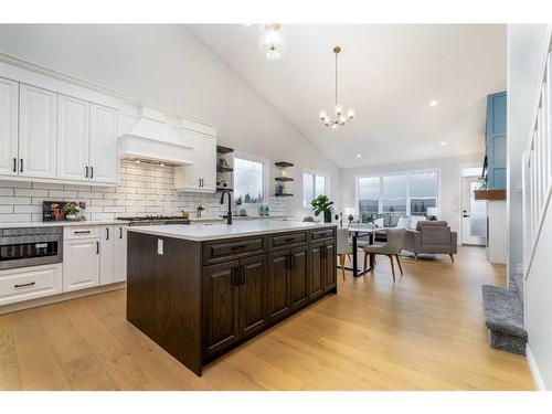 443 Rivercrest View, Cochrane, AB - Indoor Photo Showing Kitchen With Upgraded Kitchen