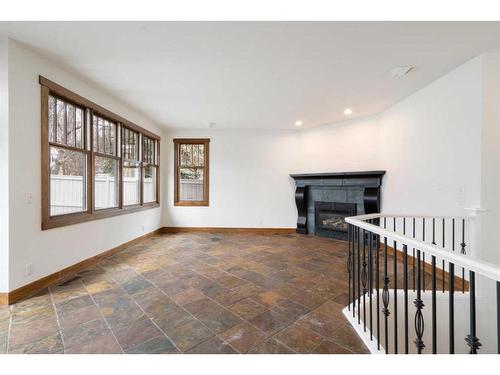 379 Mountain Park Drive Se, Calgary, AB - Indoor With Fireplace