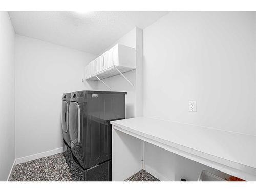 602 Creekstone Circle Sw, Calgary, AB - Indoor Photo Showing Laundry Room