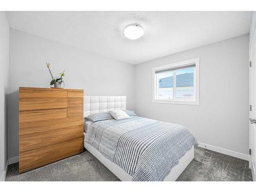 602 Creekstone Circle Sw, Calgary, AB - Indoor Photo Showing Bedroom