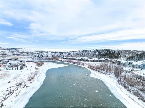14 Riviera Way, Cochrane, AB - Outdoor With Body Of Water With View
