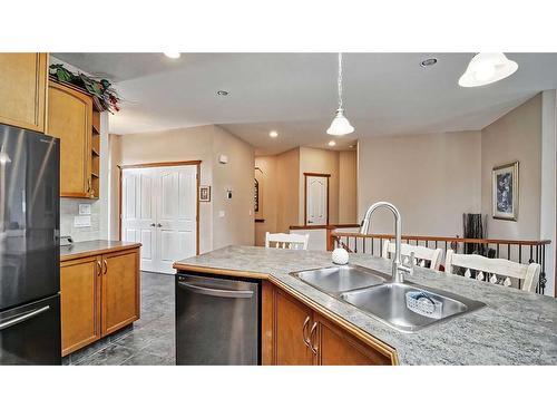39 Panatella Crescent Nw, Calgary, AB - Indoor Photo Showing Kitchen With Double Sink