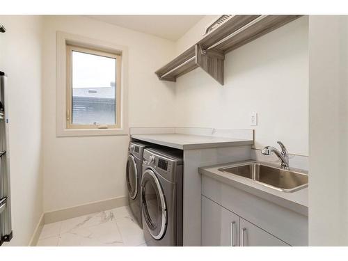 13 Walden Park Se, Calgary, AB - Indoor Photo Showing Laundry Room