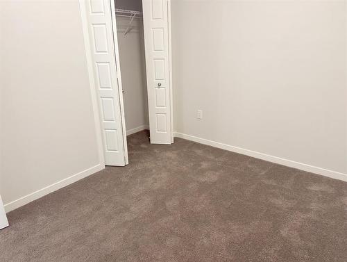 311-80 Carrington Plaza Nw, Calgary, AB - Indoor Photo Showing Other Room