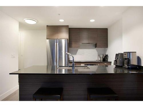 705-1500 7 Street Sw, Calgary, AB - Indoor Photo Showing Kitchen With Upgraded Kitchen