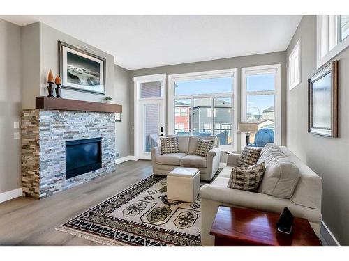 44 Legacy Court Se, Calgary, AB - Indoor Photo Showing Living Room With Fireplace