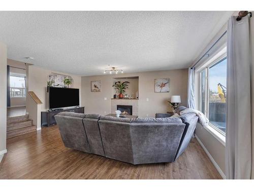 141 West Lakeview Point, Chestermere, AB - Indoor Photo Showing Living Room With Fireplace