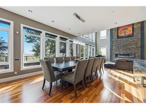 2216 8 Street Ne, Calgary, AB - Indoor Photo Showing Dining Room With Fireplace