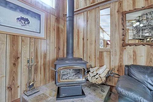 33122 Range Road 50, Sundre, AB - Indoor Photo Showing Other Room With Fireplace