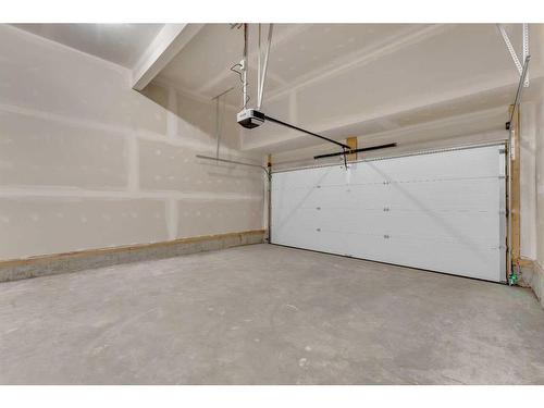 212 Seton Heath Se, Calgary, AB - Indoor Photo Showing Garage