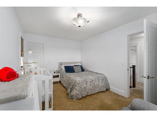 29 Cimarron Springs Road, Okotoks, AB - Indoor Photo Showing Bedroom