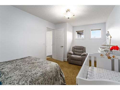 29 Cimarron Springs Road, Okotoks, AB - Indoor Photo Showing Bedroom