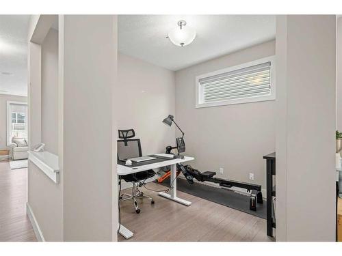 60 Evansfield Way Nw, Calgary, AB - Indoor Photo Showing Gym Room