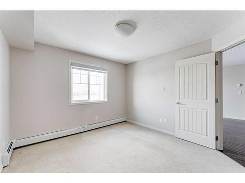 306-304 Cranberry Park Se, Calgary, AB - Indoor Photo Showing Other Room