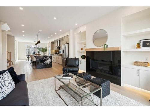 440 23 Avenue Nw, Calgary, AB - Indoor Photo Showing Living Room With Fireplace