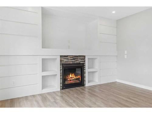 1347 Scarlett Ranch Boulevard, Carstairs, AB - Indoor With Fireplace