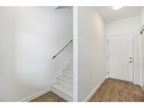 602-335 Creekside Boulevard Sw, Calgary, AB - Indoor Photo Showing Other Room