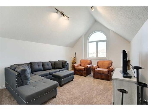 114 West Terrace Point, Cochrane, AB - Indoor Photo Showing Living Room