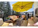 114 West Terrace Point, Cochrane, AB  - Outdoor With Deck Patio Veranda With Exterior 