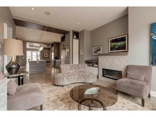 617 16 Street Nw, Calgary, AB - Indoor Photo Showing Living Room With Fireplace
