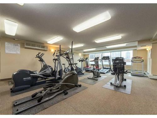 1101-1121 6 Avenue Sw, Calgary, AB - Indoor Photo Showing Gym Room
