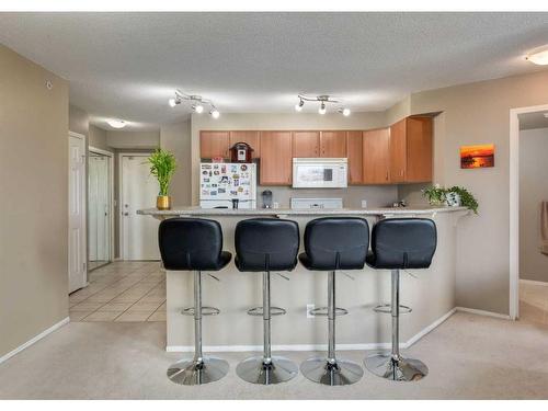 1101-1121 6 Avenue Sw, Calgary, AB - Indoor Photo Showing Kitchen