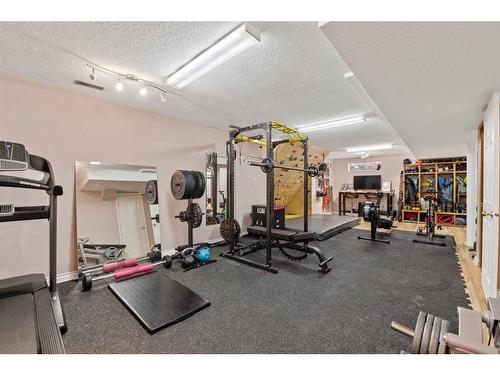 10979 Valley Ridge Drive Nw, Calgary, AB - Indoor Photo Showing Gym Room