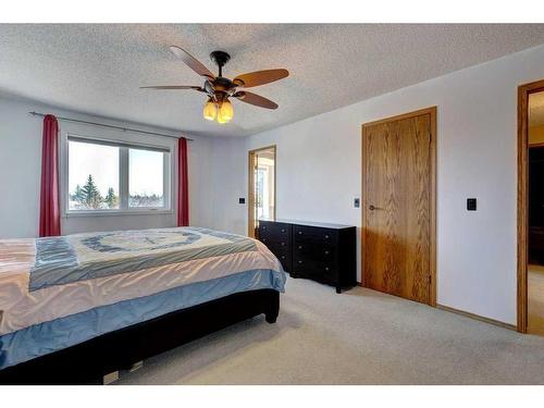 44 Woodfern Way Sw, Calgary, AB - Indoor Photo Showing Bedroom