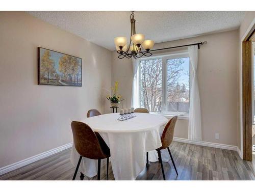 44 Woodfern Way Sw, Calgary, AB - Indoor Photo Showing Dining Room