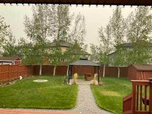 104 1 Avenue Se, Langdon, AB - Outdoor With Backyard