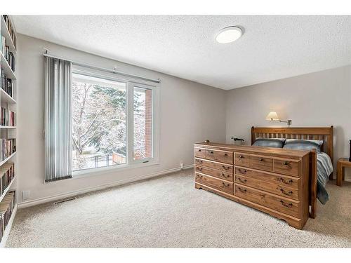 123 Canterville Drive Sw, Calgary, AB - Indoor Photo Showing Bedroom