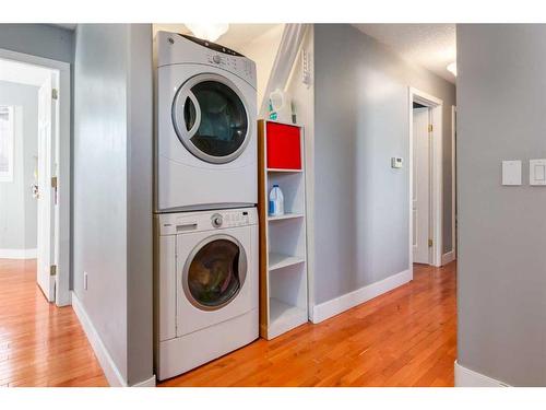 22 Elma Street West, Okotoks, AB - Indoor Photo Showing Laundry Room