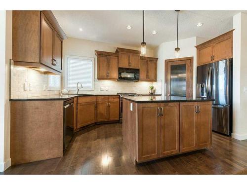 62 Aspen Hills Way Sw, Calgary, AB - Indoor Photo Showing Kitchen With Stainless Steel Kitchen
