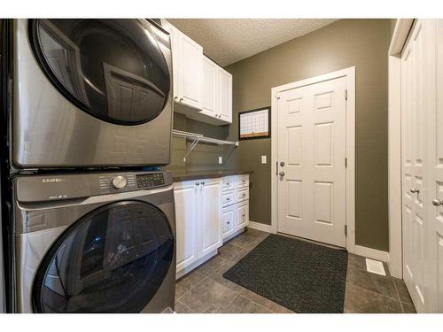 62 Aspen Hills Way Sw, Calgary, AB - Indoor Photo Showing Laundry Room