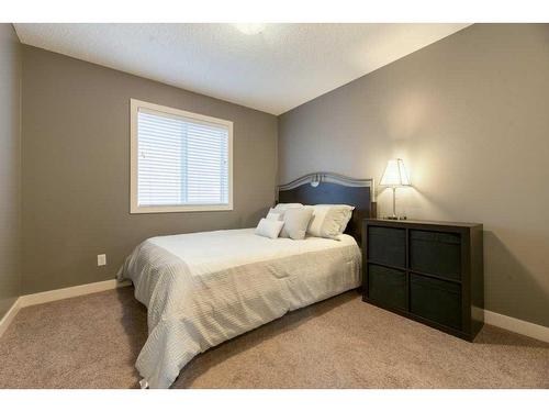 62 Aspen Hills Way Sw, Calgary, AB - Indoor Photo Showing Bedroom