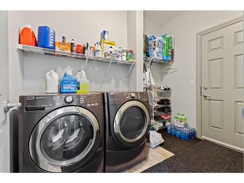 381 Saddlemont Boulevard Ne, Calgary, AB - Indoor Photo Showing Laundry Room