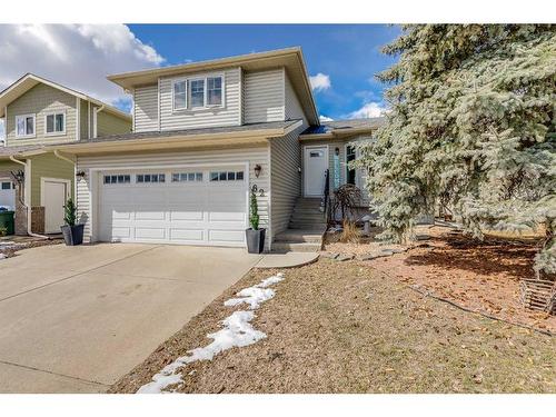 62 Downey Road, Okotoks, AB - Outdoor With Facade