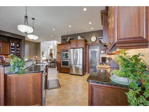 22 Tuscany Estates Crescent Nw, Calgary, AB - Indoor Photo Showing Kitchen With Upgraded Kitchen
