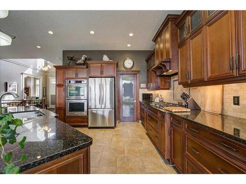 22 Tuscany Estates Crescent Nw, Calgary, AB - Indoor Photo Showing Kitchen With Upgraded Kitchen