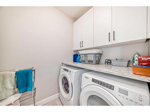 153 Carrington Close Nw, Calgary, AB - Indoor Photo Showing Laundry Room