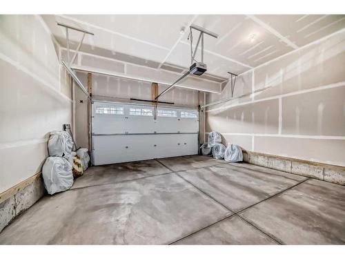 153 Carrington Close Nw, Calgary, AB - Indoor Photo Showing Garage