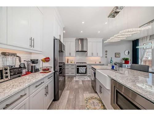 153 Carrington Close Nw, Calgary, AB - Indoor Photo Showing Kitchen With Upgraded Kitchen