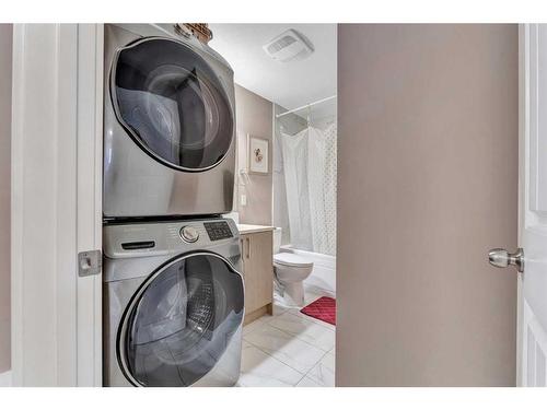 128 Laguna Close Ne, Calgary, AB - Indoor Photo Showing Laundry Room