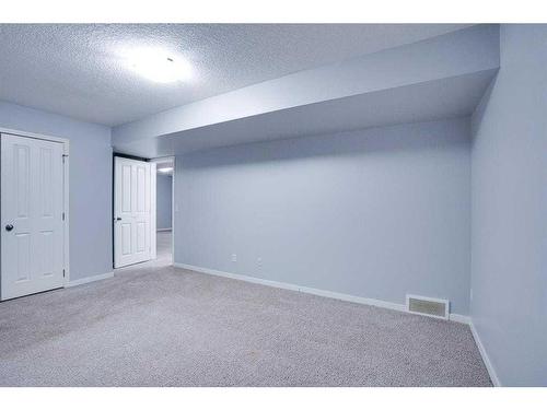 202 Reunion Green Nw, Airdrie, AB - Indoor Photo Showing Other Room