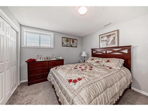 409 Freeman Way Nw, High River, AB - Indoor Photo Showing Bedroom