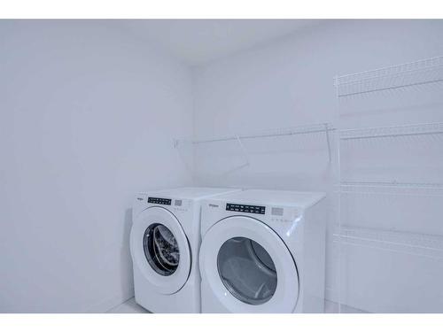 46 Legacy Glen Crescent Se, Calgary, AB - Indoor Photo Showing Laundry Room