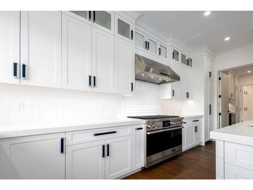 40 Aspen Ridge Terrace Sw, Calgary, AB - Indoor Photo Showing Kitchen With Upgraded Kitchen