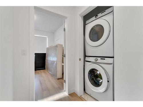 111-101 Panatella Square, Calgary, AB - Indoor Photo Showing Laundry Room